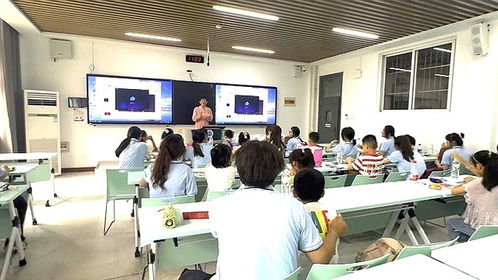外院大手拉小手非遗传承实践团青春接力传薪火,红色基因永传承
